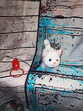 White Plush Cat with Pink Ears